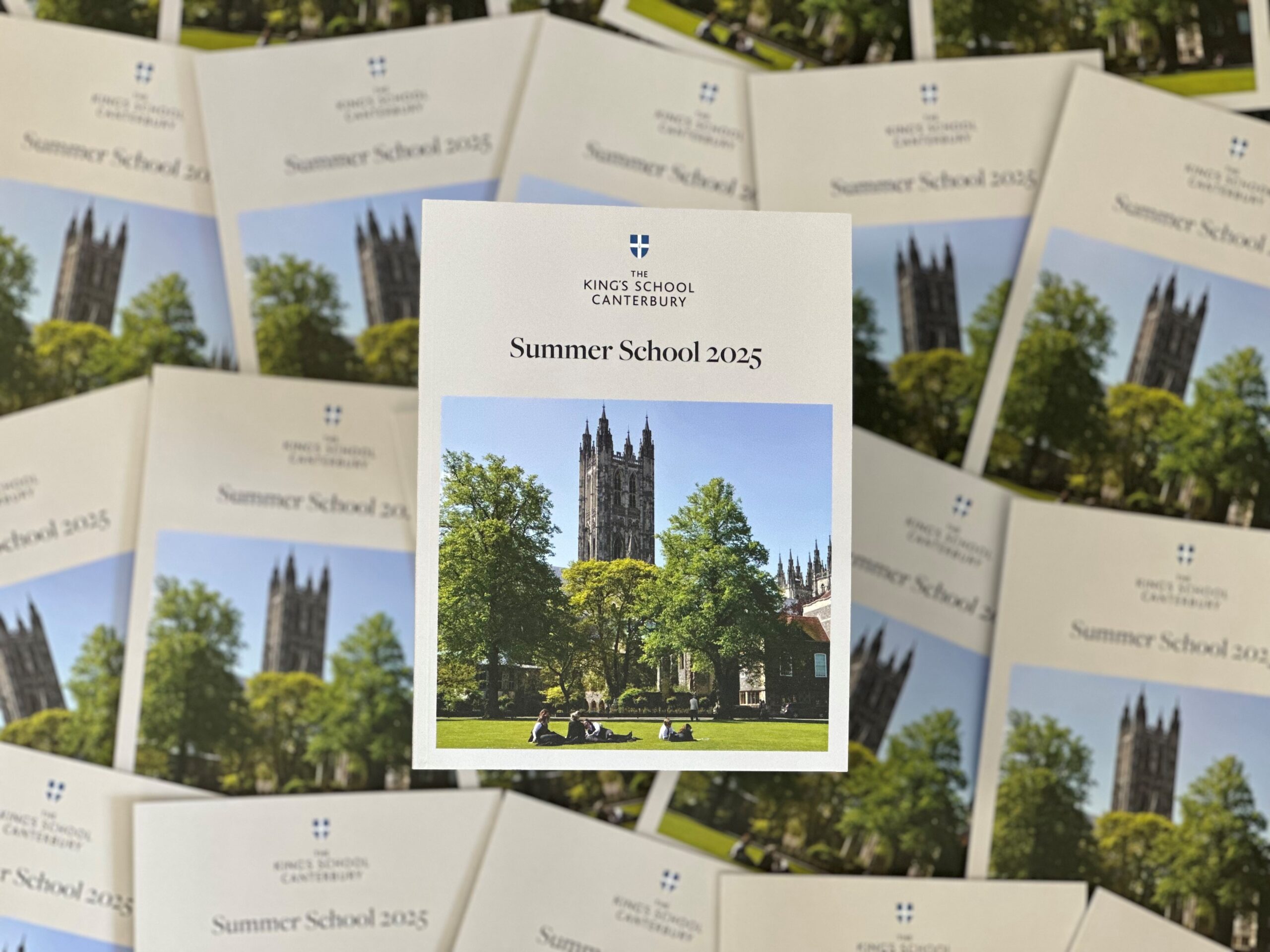 A collection of booklets, all of which are titled: "The King's School Canterbury Summer School 2025". The booklet has an image of The King's Summer School below this text.